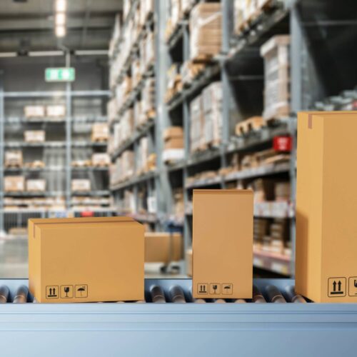 Boxes on belt in warehouse